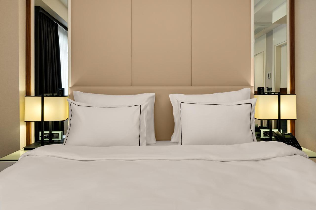 Gleam Collection Hotel Κωνσταντινούπολη Εξωτερικό φωτογραφία A bed with two pillows